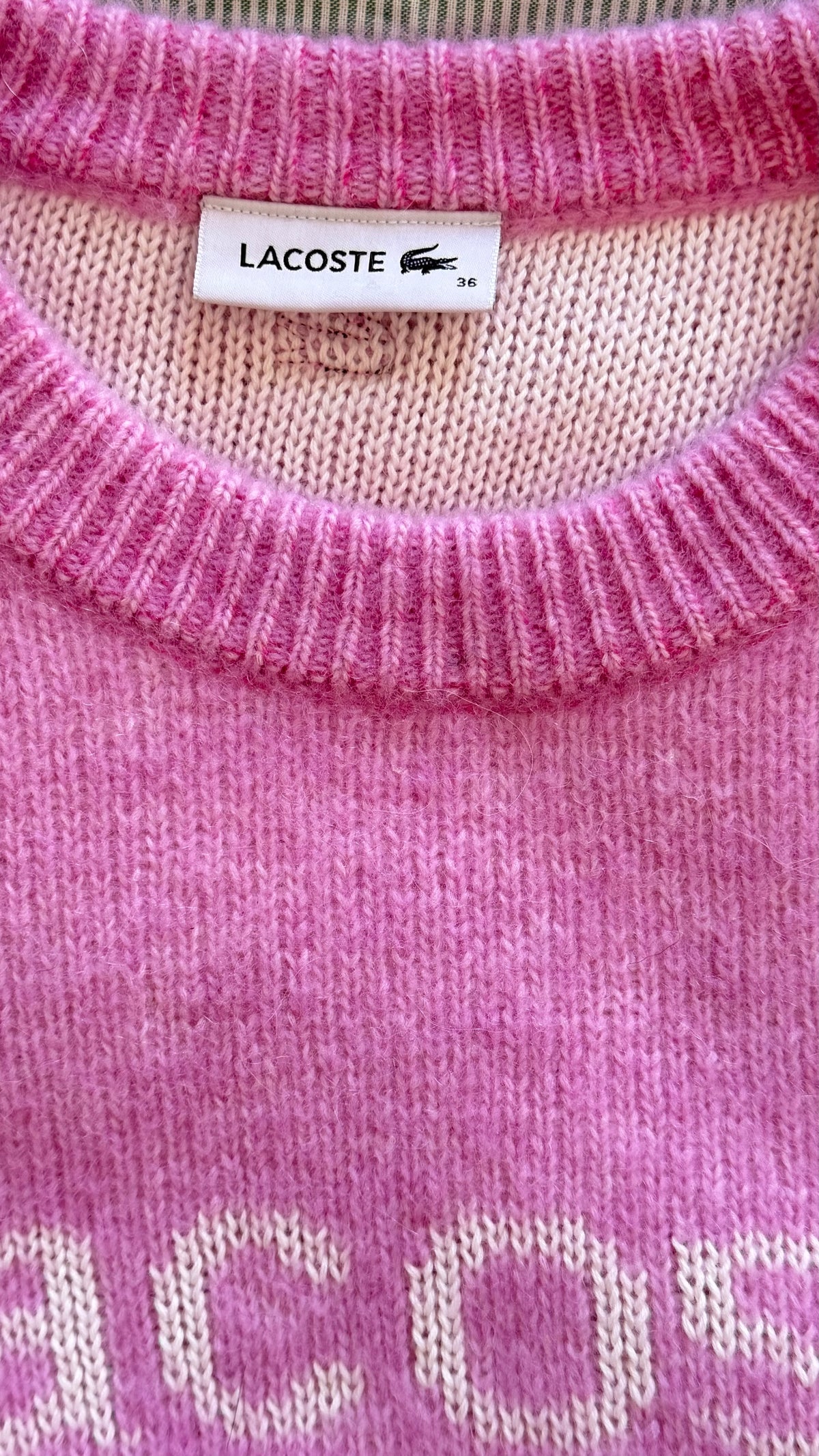 Pull en laine rose Lacoste - M